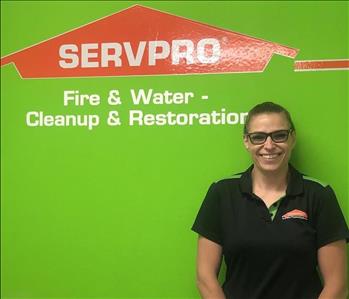 danelle with green servpro background