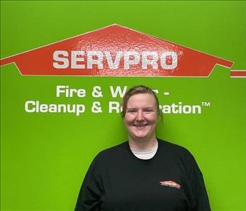 Jessica with green servpro background