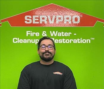 Paul with green servpro background